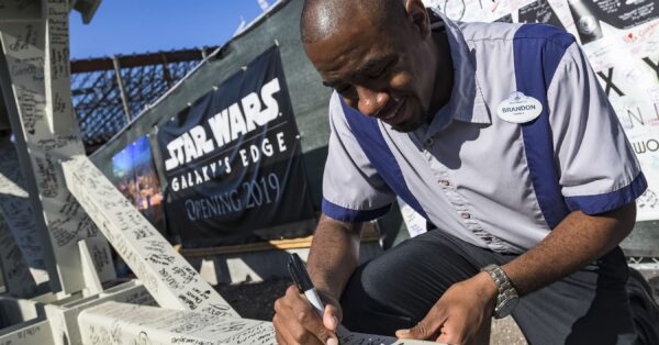 Disney's Hollywood Studios Cast Members Autograph Structural Beam for New Star Wars: Galaxy's Edge